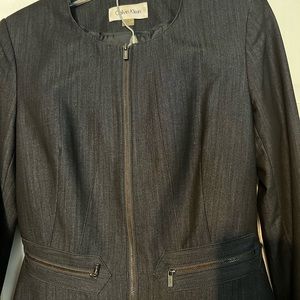 Calvin Klein modern fit suit. Gun metal accent zippers. Dark blue denim look.